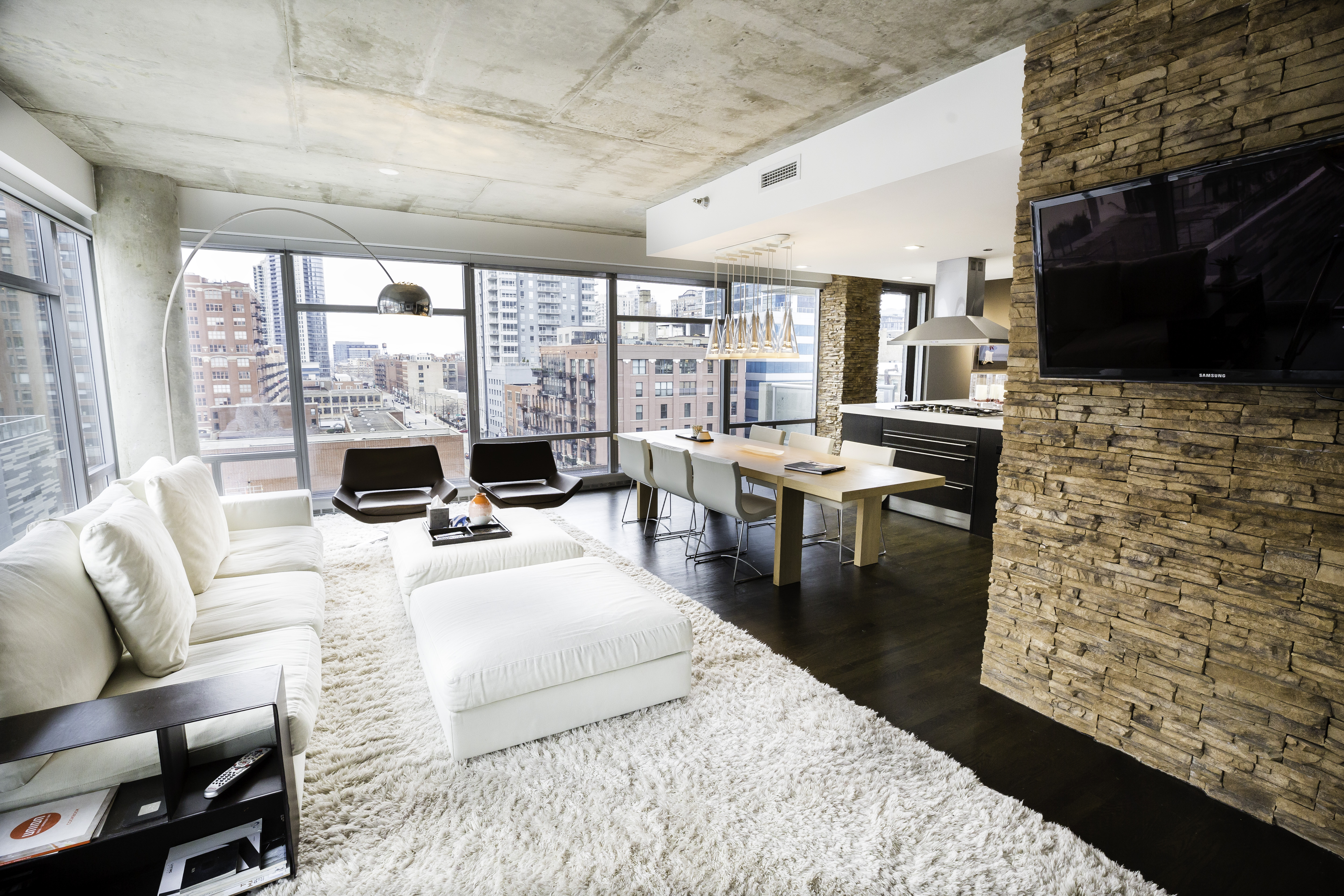 A living room filled with furniture and a flat screen tv.