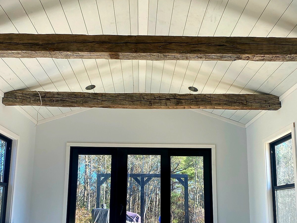 reclaimed hand hewn beams in ceiling
