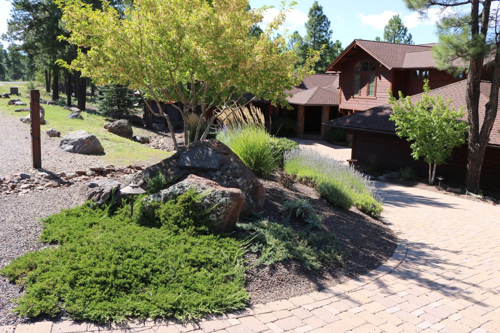 Landscape Expert — Classic Landscape For A Brown House in Flagstaff, AZ