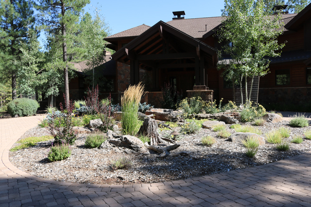 Landscaping Experts — Simple Landscape In A Brown House in Flagstaff, AZ