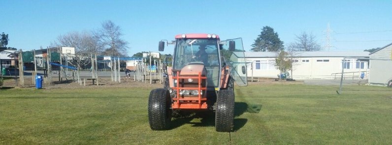 Farmer fertilizing with his tractor
