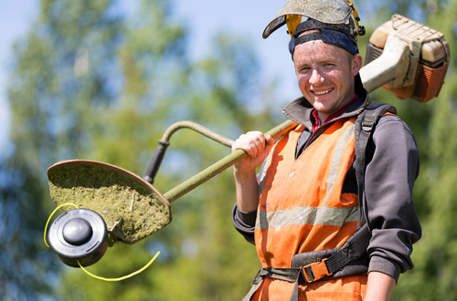 Expert with his turf installer tool
