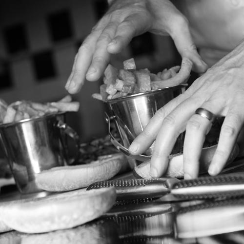 Fish and chips being prepared in Whitby