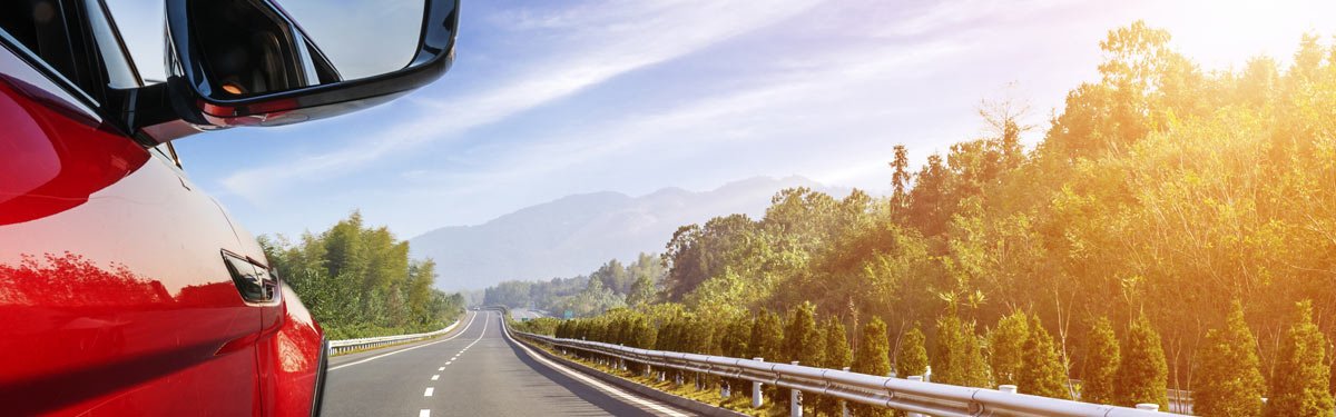 excelr8 driving school car on highway