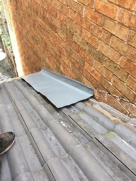 Roof repair work in progress