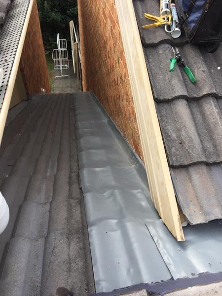 Roof repair work in progress