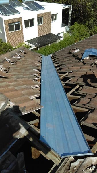 Roof valley being replaced