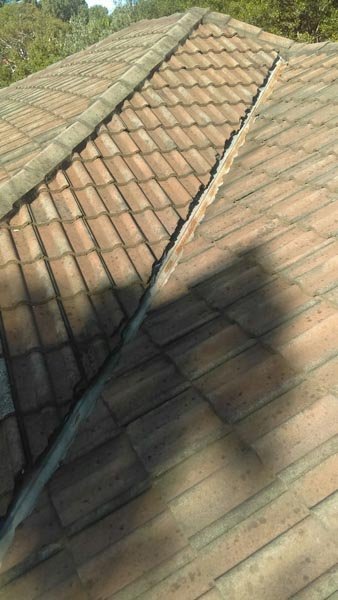 Closer view of a roof being replaced