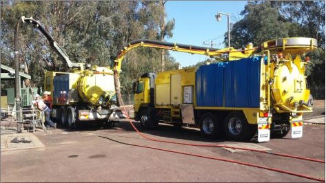 yellow trucks with drain hoses