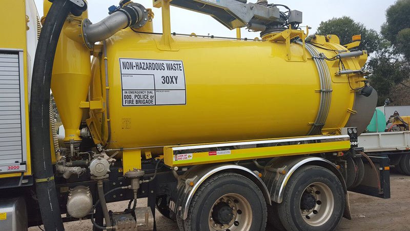 sign on yellow truck