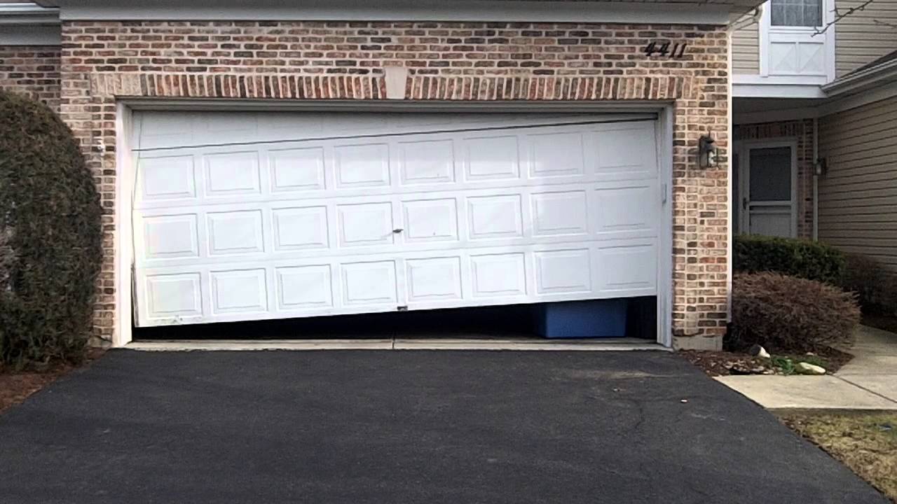 garage-door-repair broken door