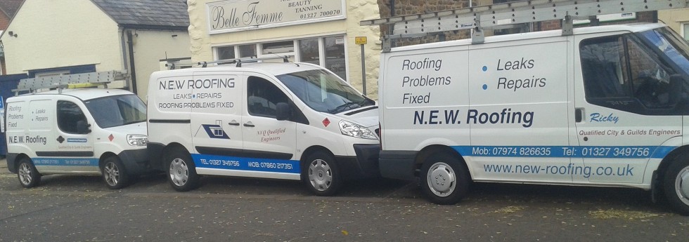 N.E.W. Roofing Service work vans