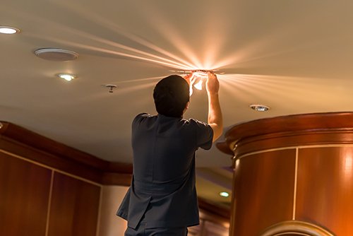 Individual installing the focus lights 