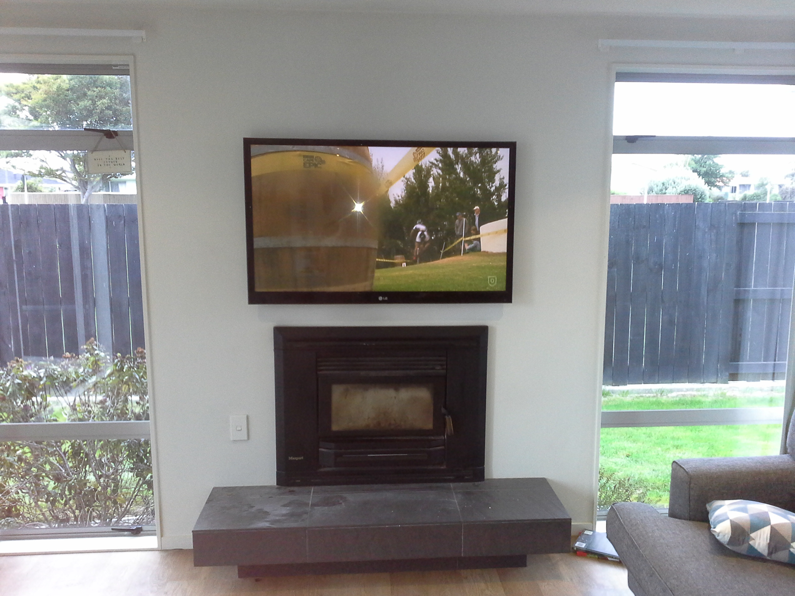 fireplace mounted tv
