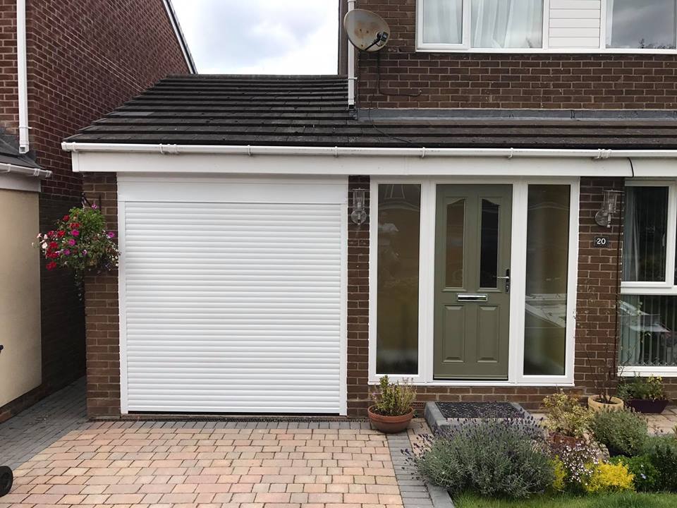 Topquality electric garage doors at Guaranteed Garage Doors