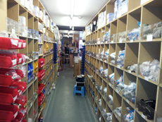 Plumbing and heating supplies arranged in one of the shop aisles