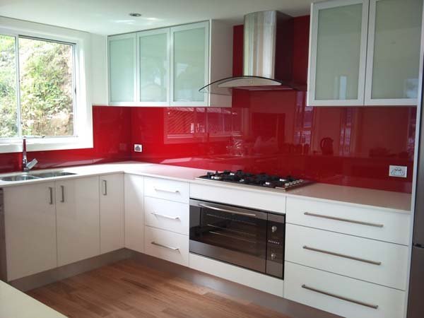 kitchen with red spash back