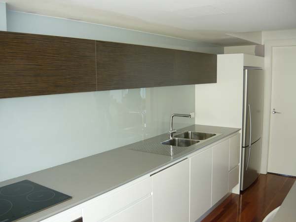 kitchen with white splashback