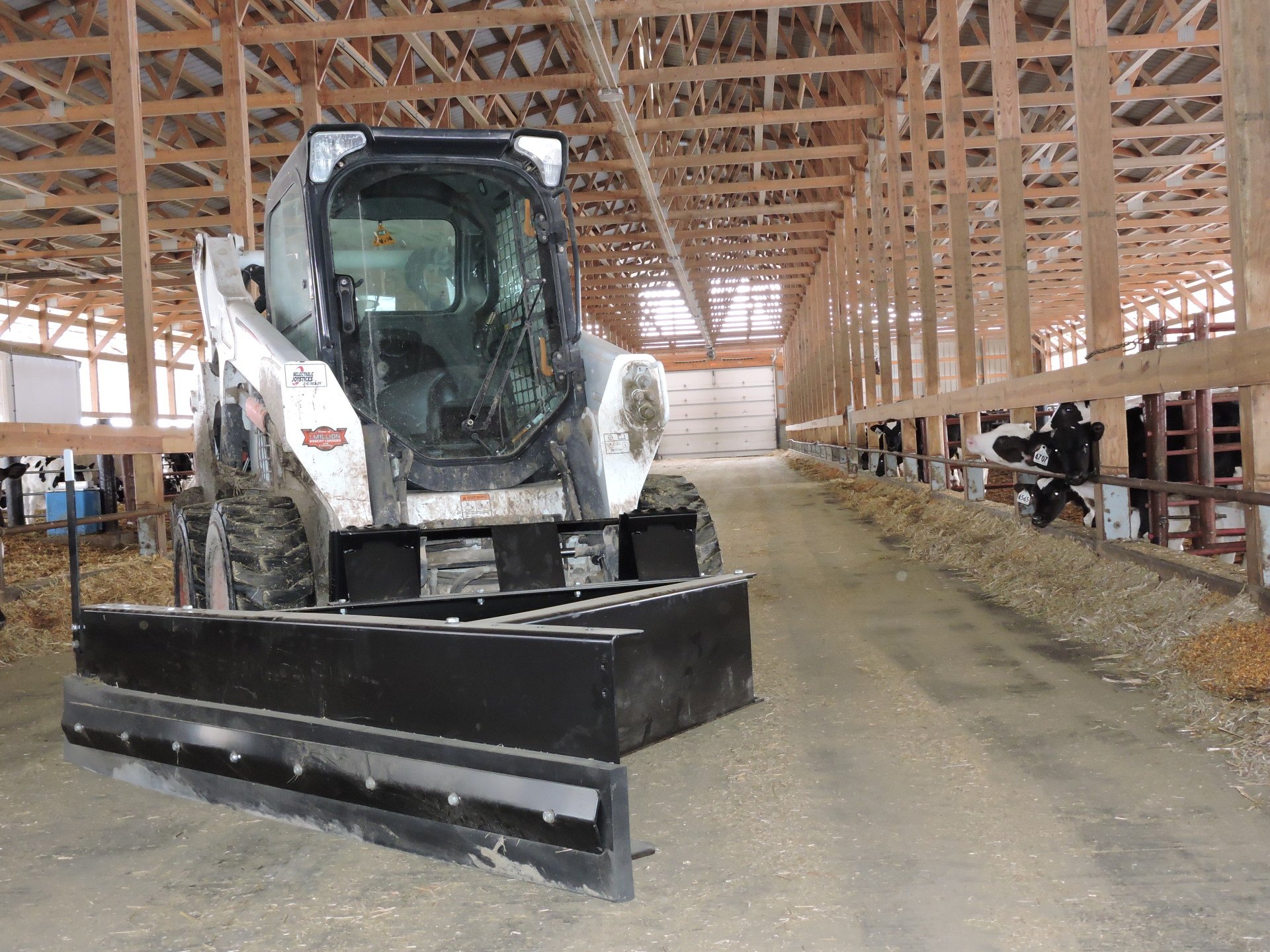 Skid Steer Livestock Feed Pusher Berlon Industries