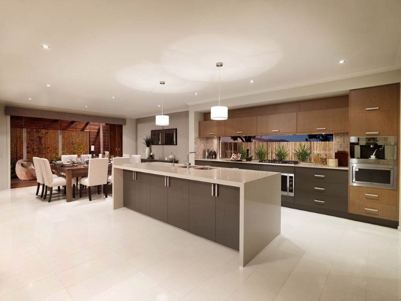grey kitchen island with white waterfall counter tops