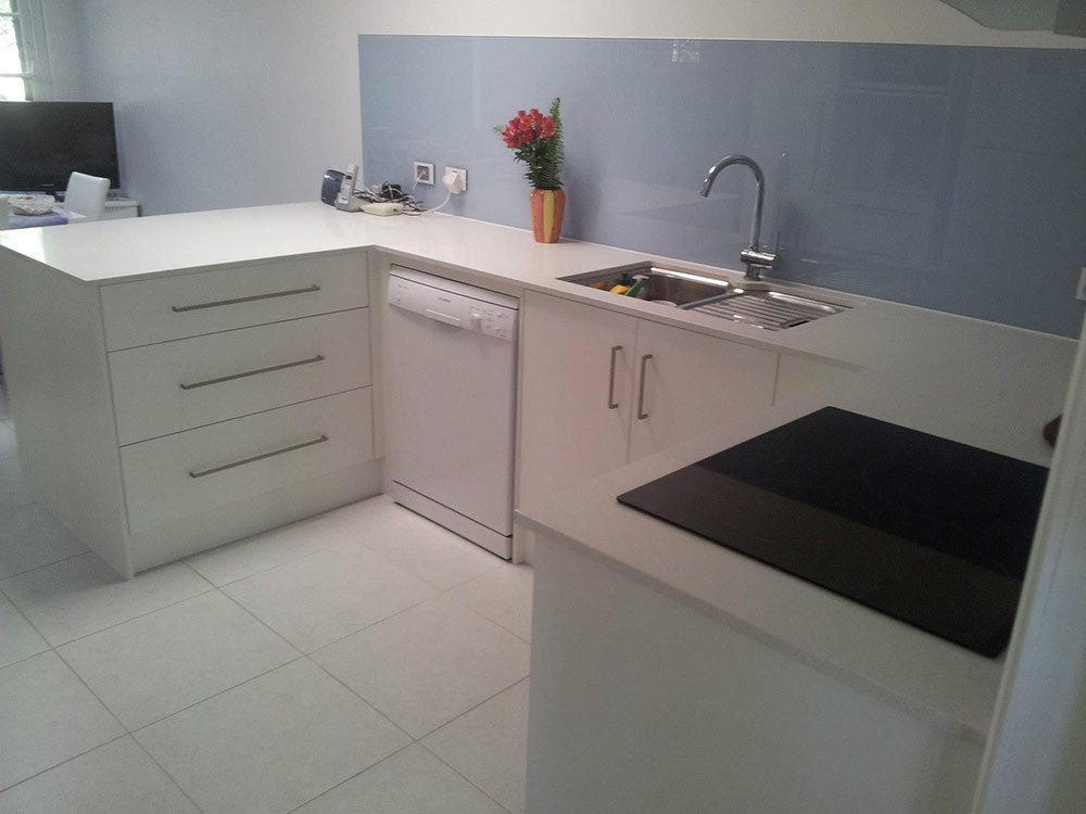 kitchen counters with white benchtop