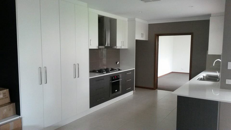 black kitchen counter with white benchtop