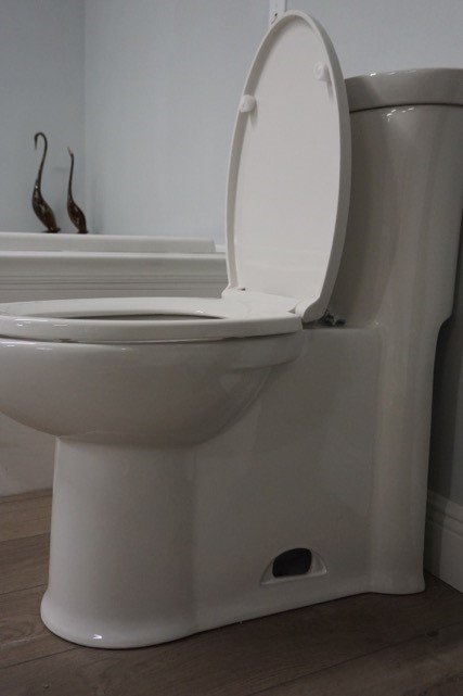 side pipe toilet