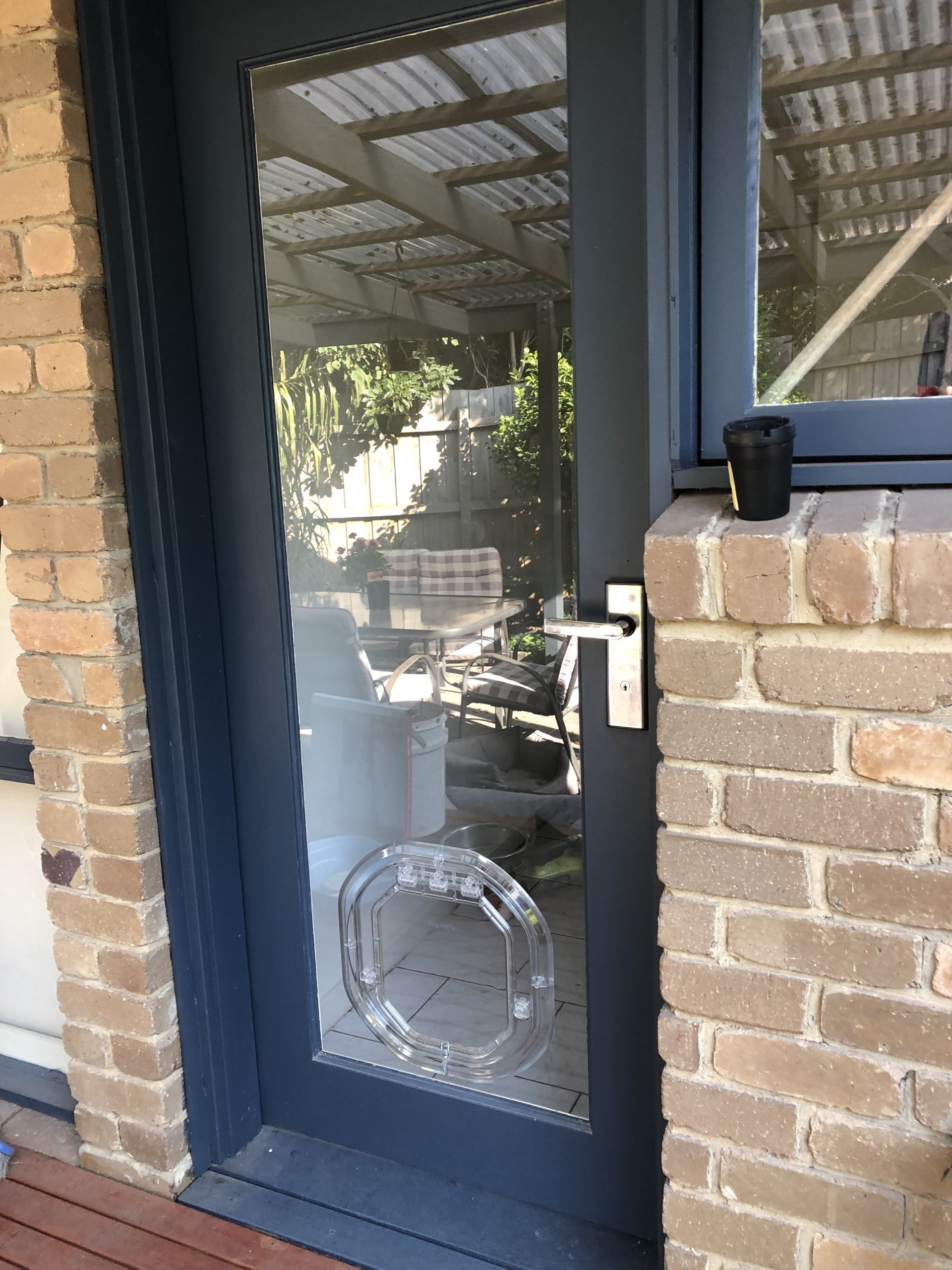 Glass Dog Door Installation CK Glass