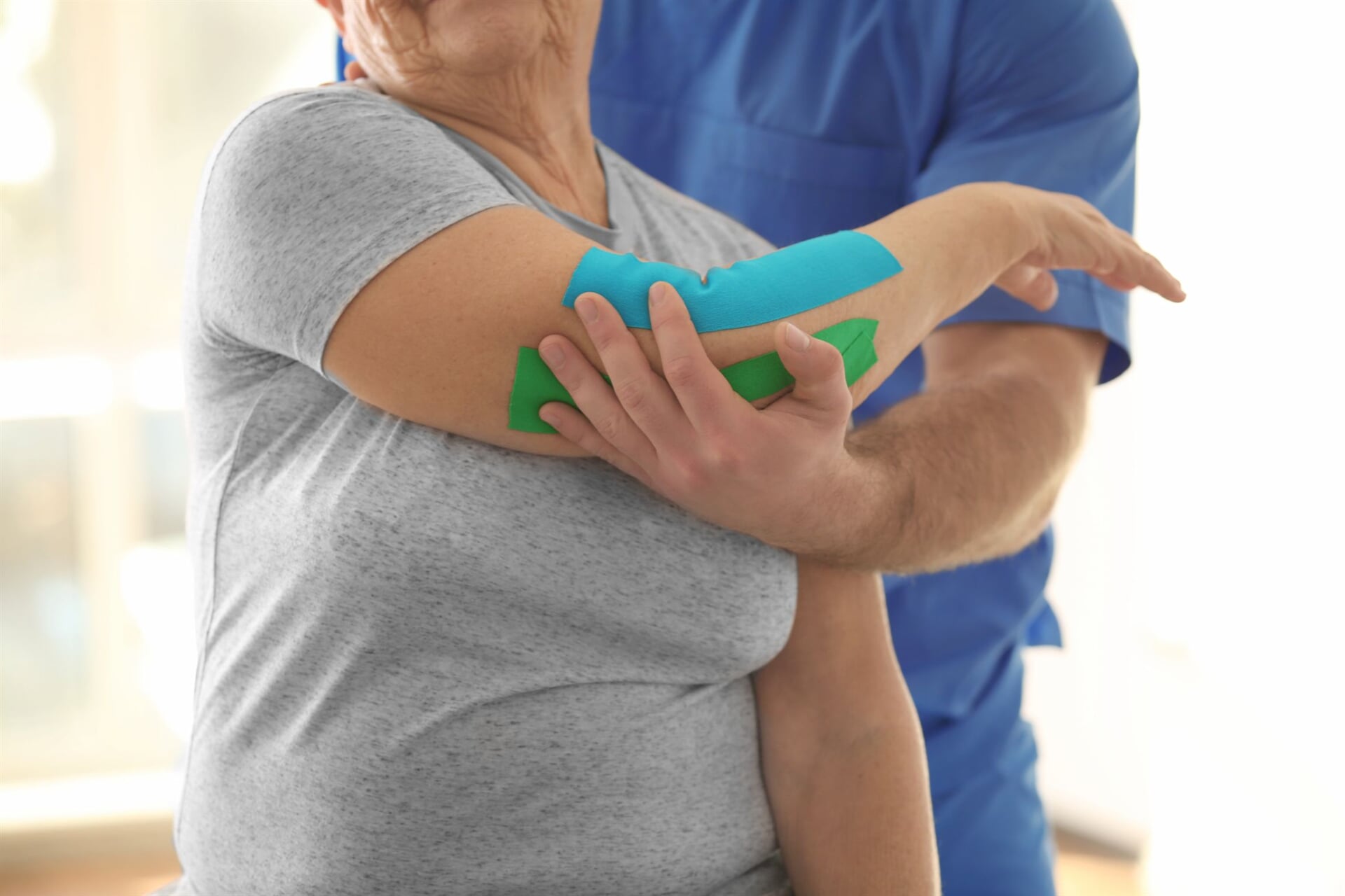 Physiotherapist Working With Elderly Patient — Goulburn Physiotherapy Centre in Goulburn, NSW