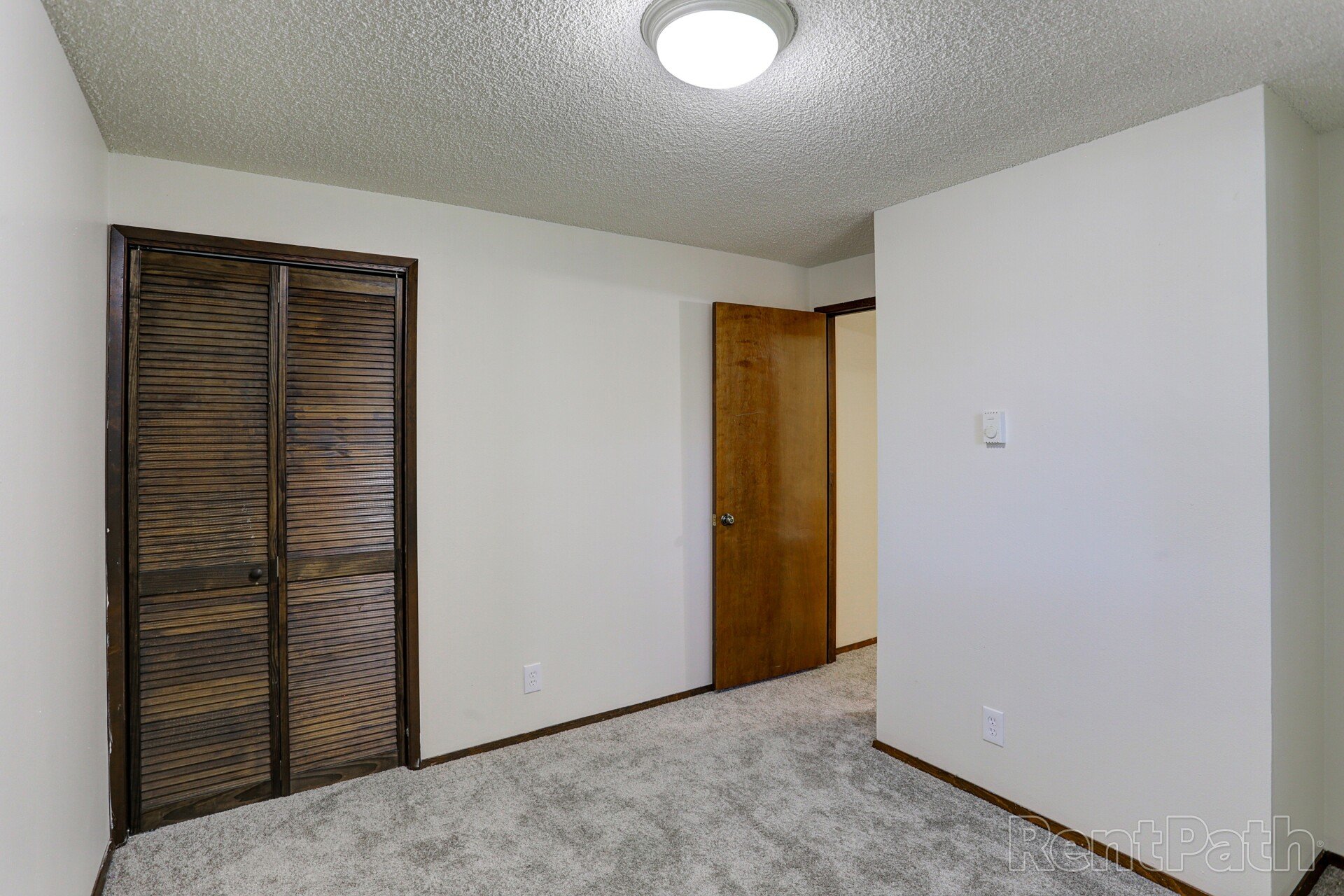 Arrowsmith Apartments Regency Management Inc.