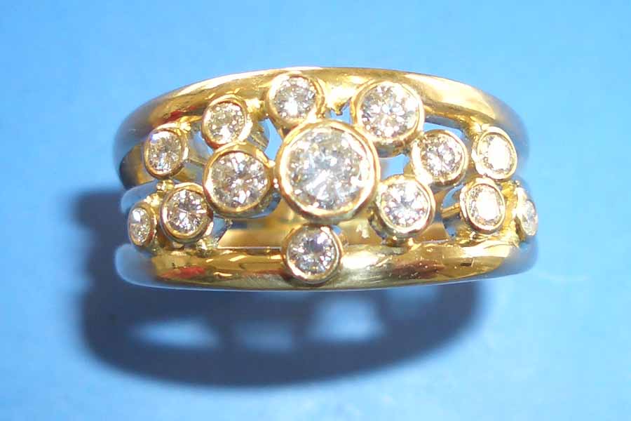 gold ring with multiple circle-cut diamonds