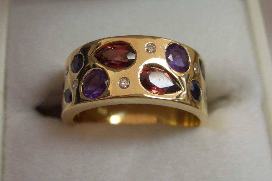 gold ring with inset stones