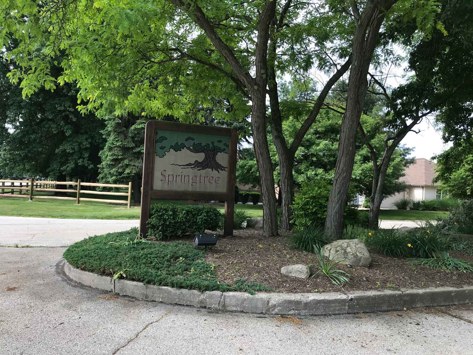 Century 21 Wilbur Realty The Springtree Condominiums Association