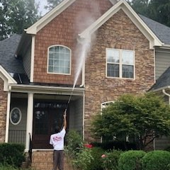 Home with Nc Powerwash car in front