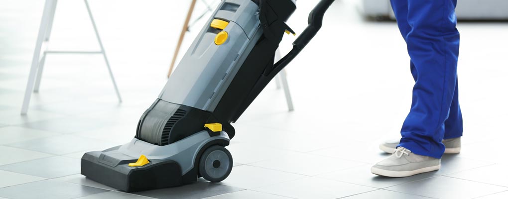 Professional cleaning the floor 