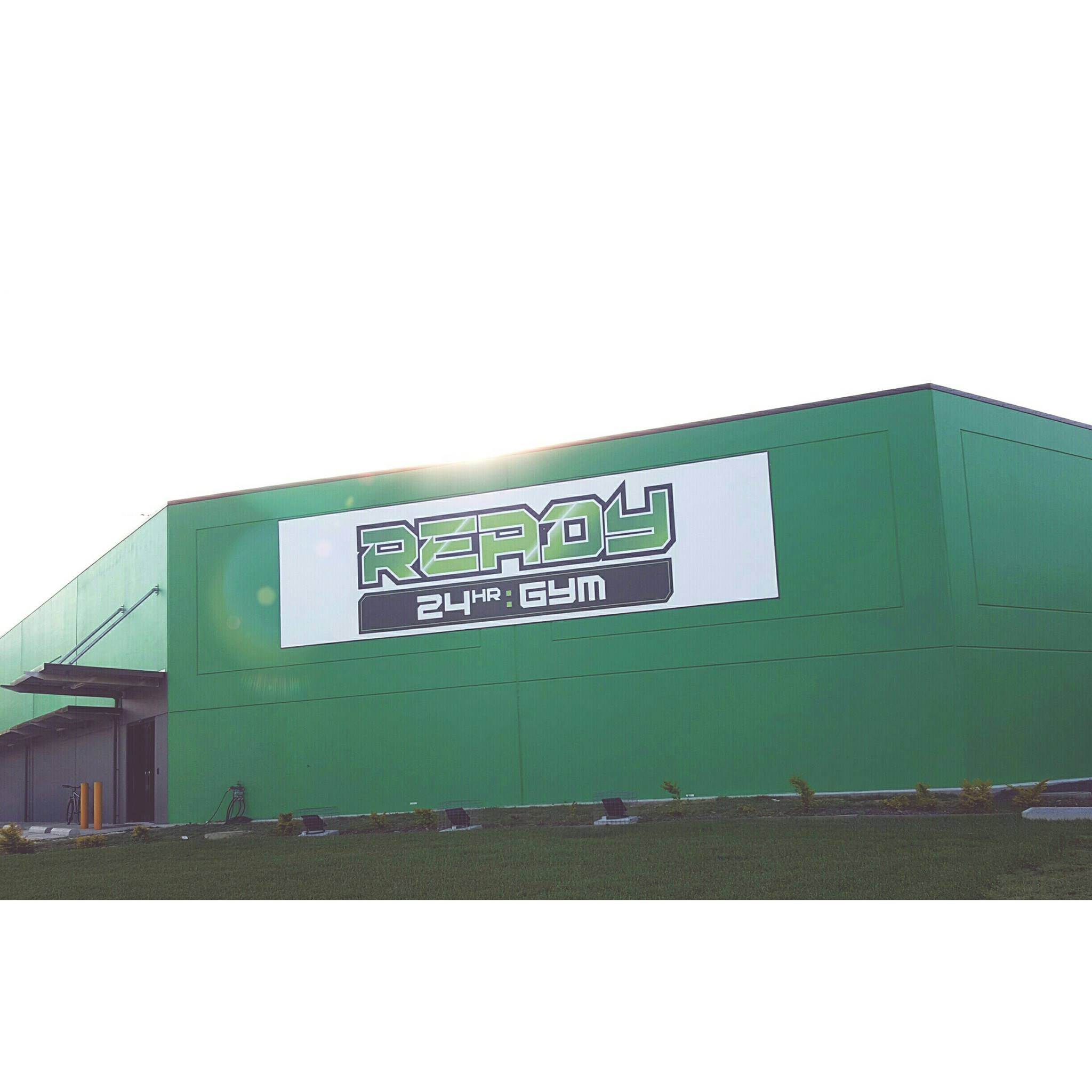 ready twenty four gym with business name in front
