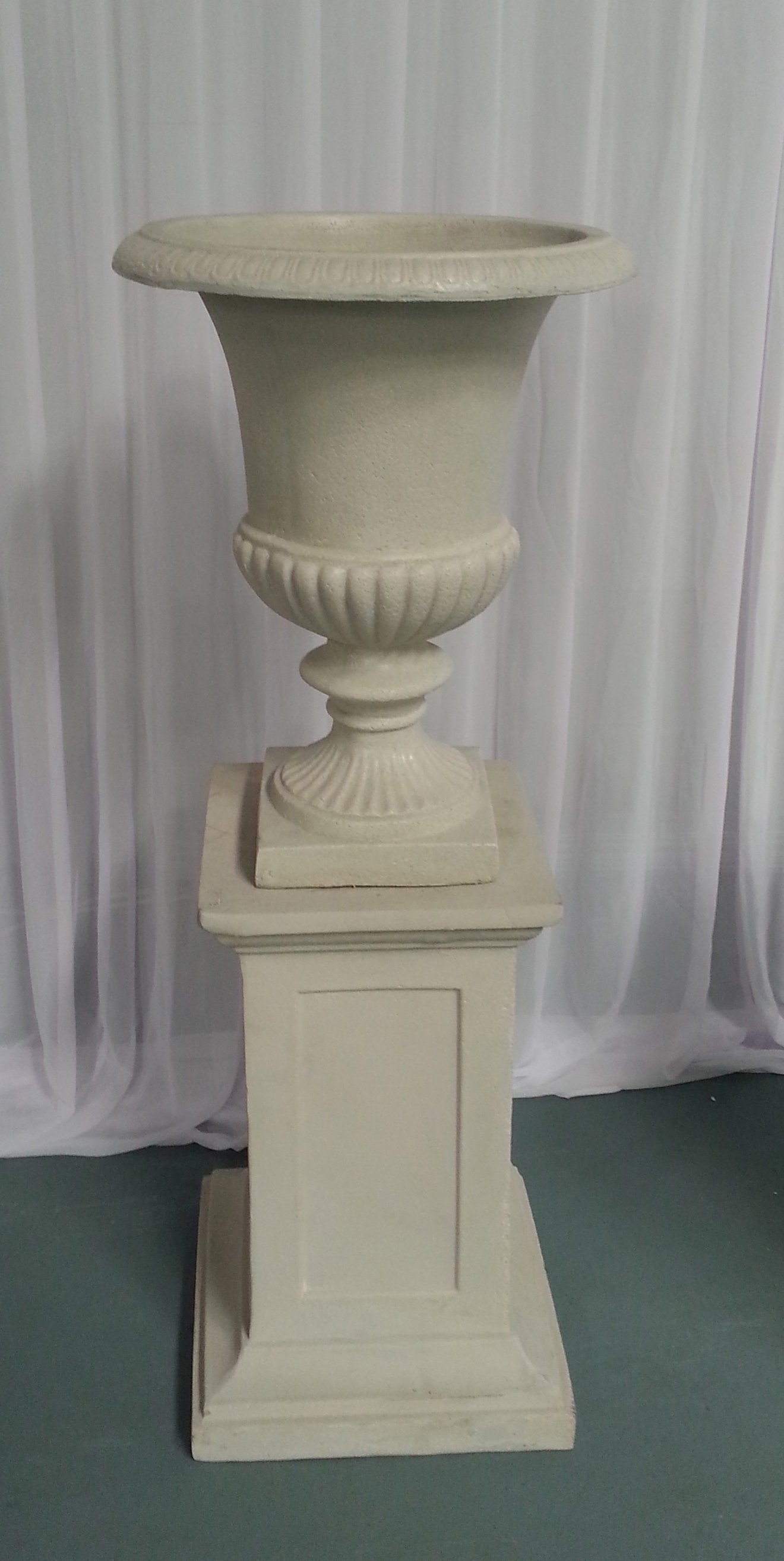 View of a big creme color flower pot