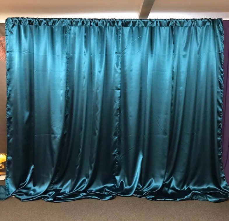 Turquoise satin wall drapes