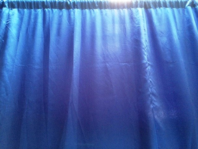 Royal blue satin wall drapes