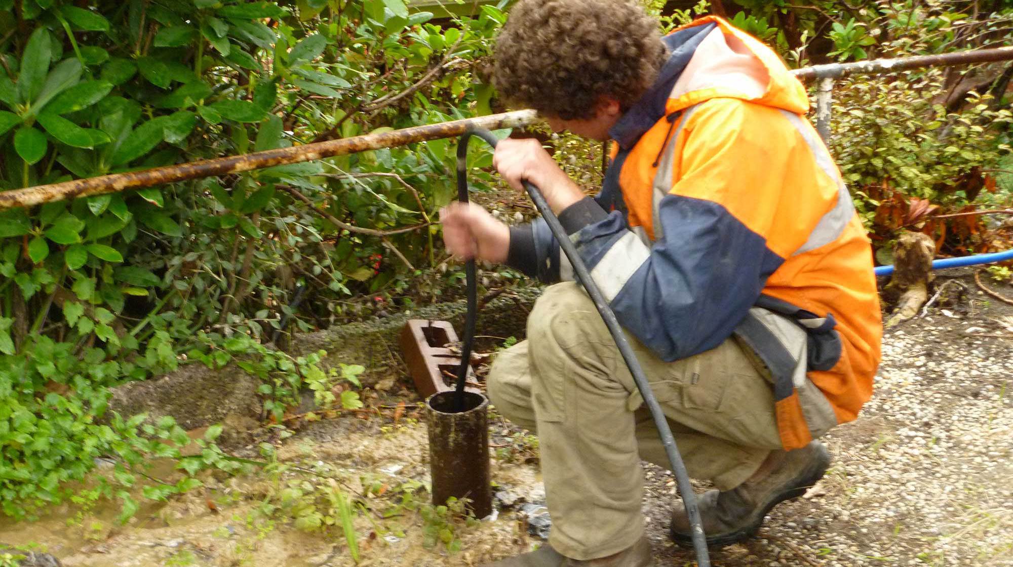 Drain cleaning in progress