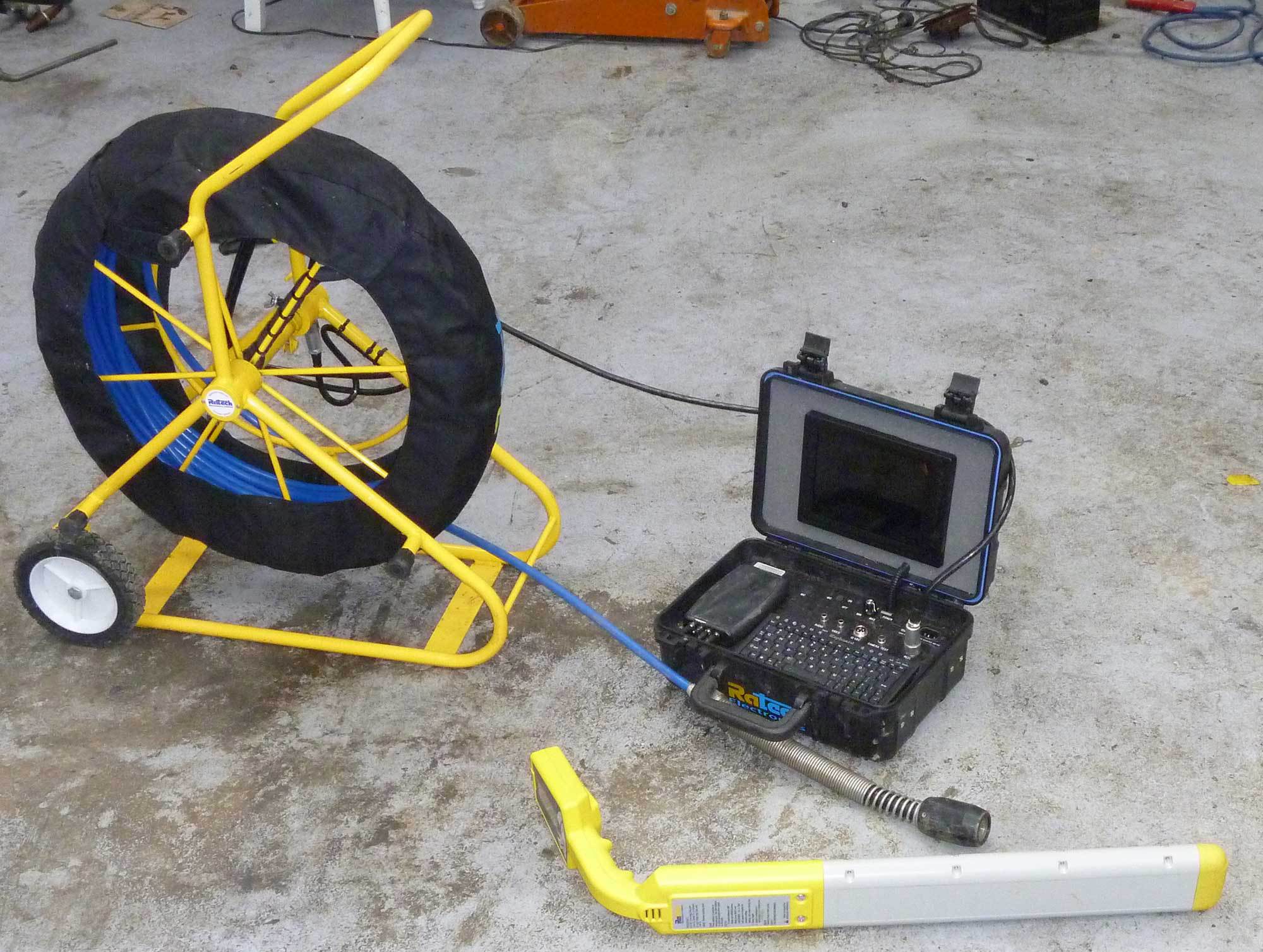 Drain cleaning in progress