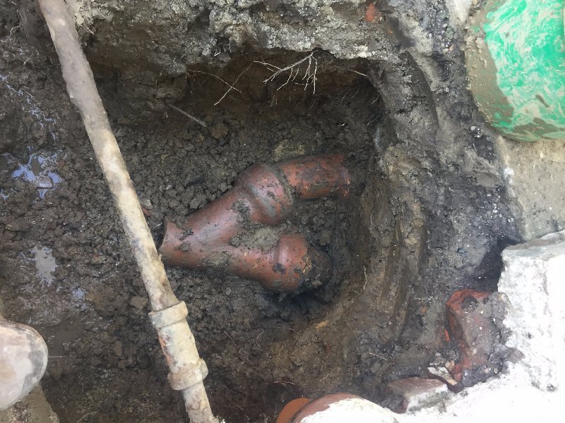 Earth being dig to unearth the drain