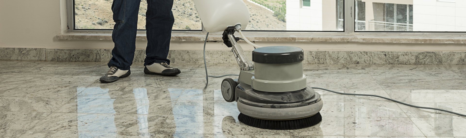 dunlops industrial and commercial cleaning woman cleaning floor steam cleaning