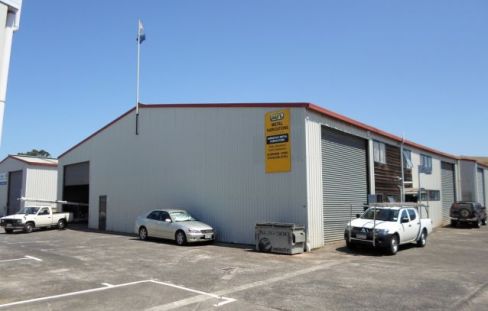 Installation of flagpole on the roof of the building