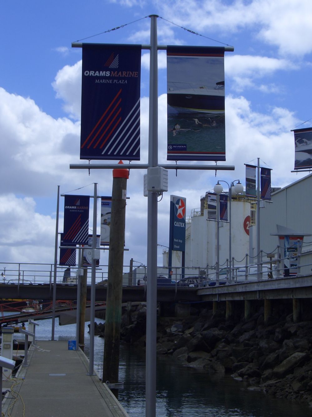 Banner poles on marina piers