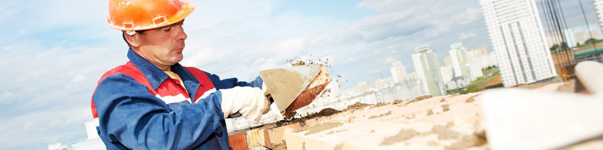 Mazden brick layer laying brick
