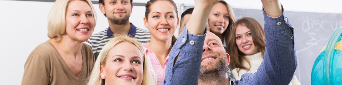 mazden office staff taking a picture mazden office staff taking a picture