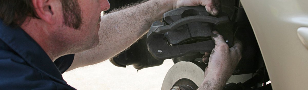 A mechanic providing service on car brakes in Gawler