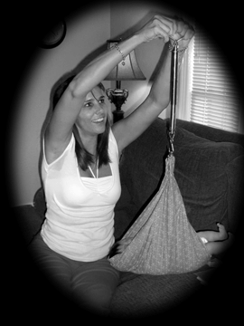 baby in handheld scale - Heavenly Hands Birthing Center