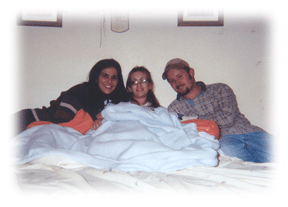 family posing with baby - Heavenly Hands Birthing Center